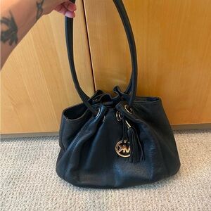 Michael Kors Black Pebbled Leather Drawstring Shoulder Bag with Tassel